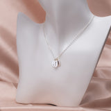 654. Oval Disc Necklace